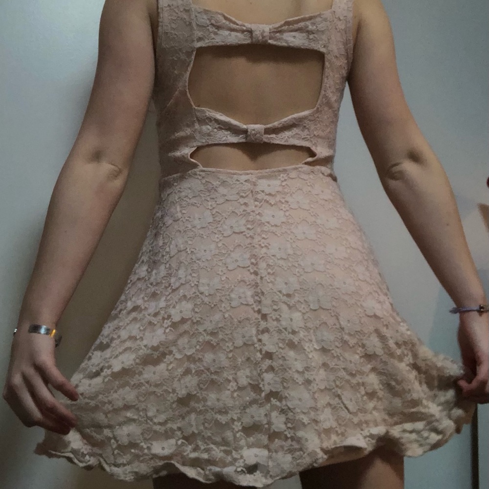 Light pastel pink lace dress with back accent
